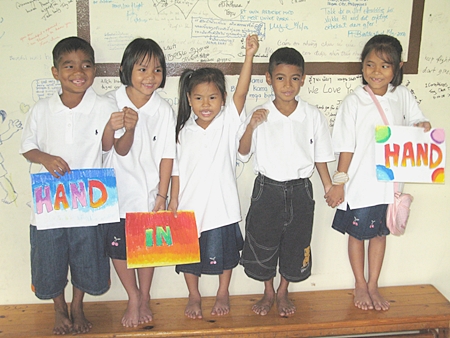 “Hand in hand”: Children at Father Joe Maier’s Mercy Centre.